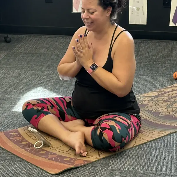 Tiny guest at K9 Rox Club puppy yoga